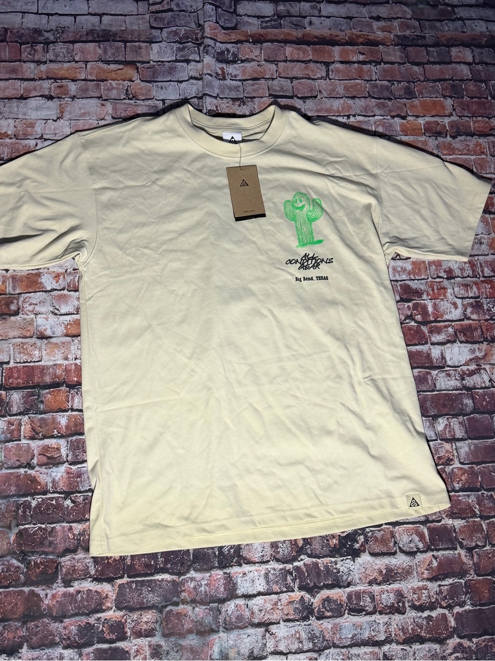 Nike Cream Short Sleeve Tee with Green Cactus Graphic